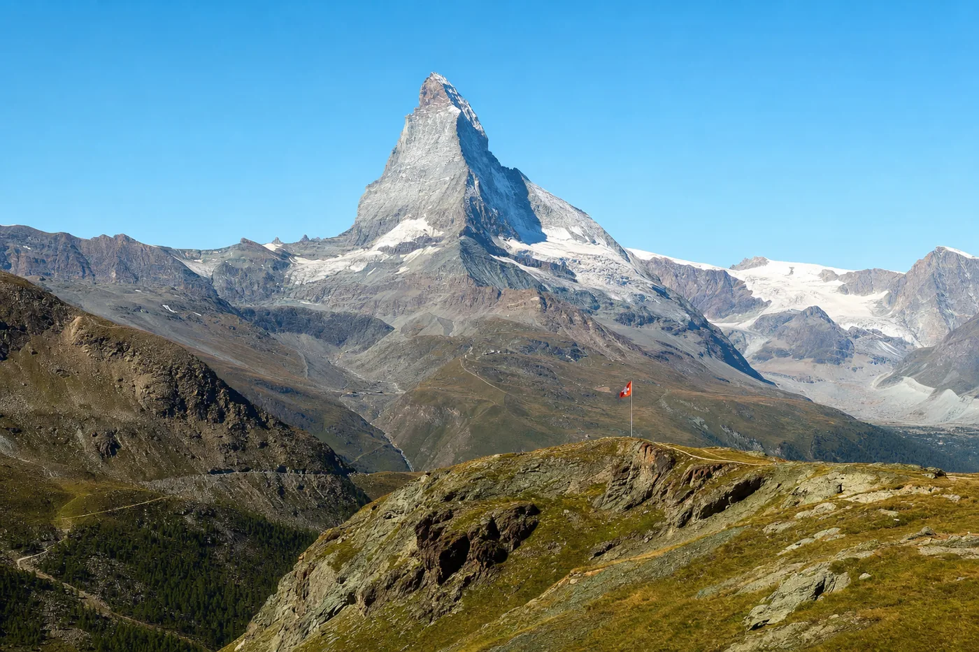 Zwitserland – bekend monument met de nationale vlag